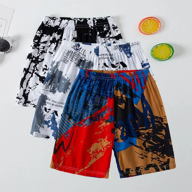 Summer children's color printing thin beach shorts boys and girls casual and comfortable pants elastic waist cute shorts.